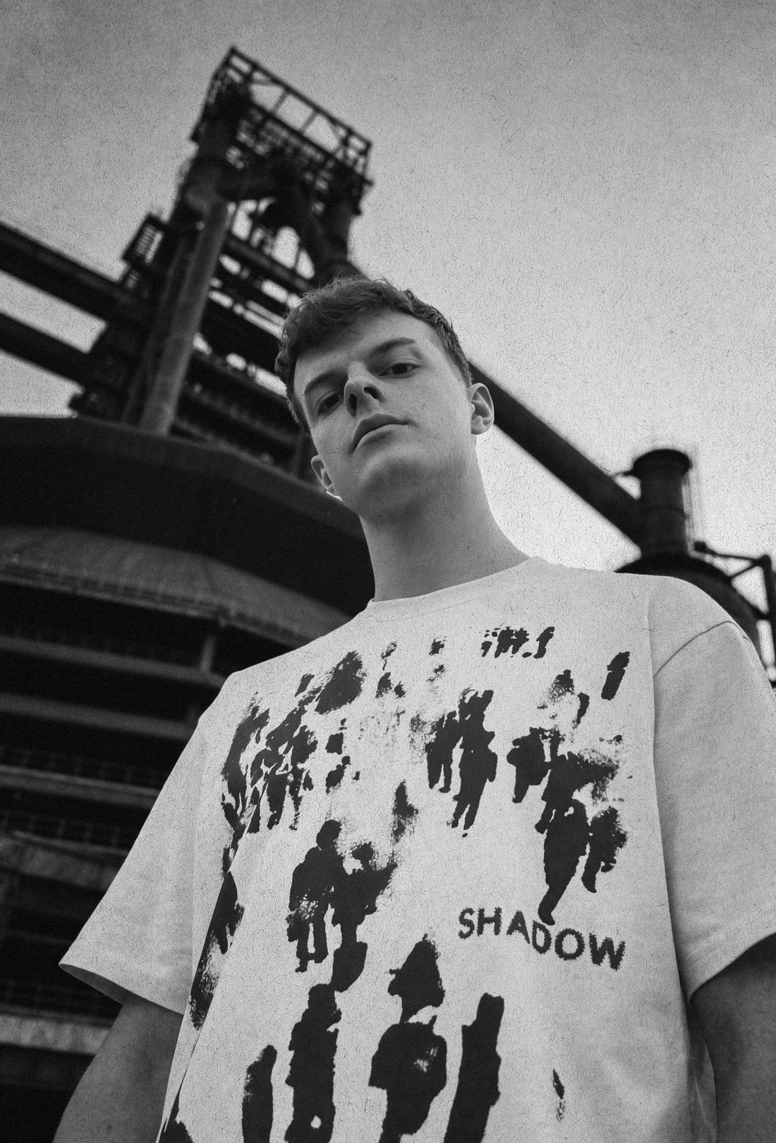 NATHN on location, industrial backdrop